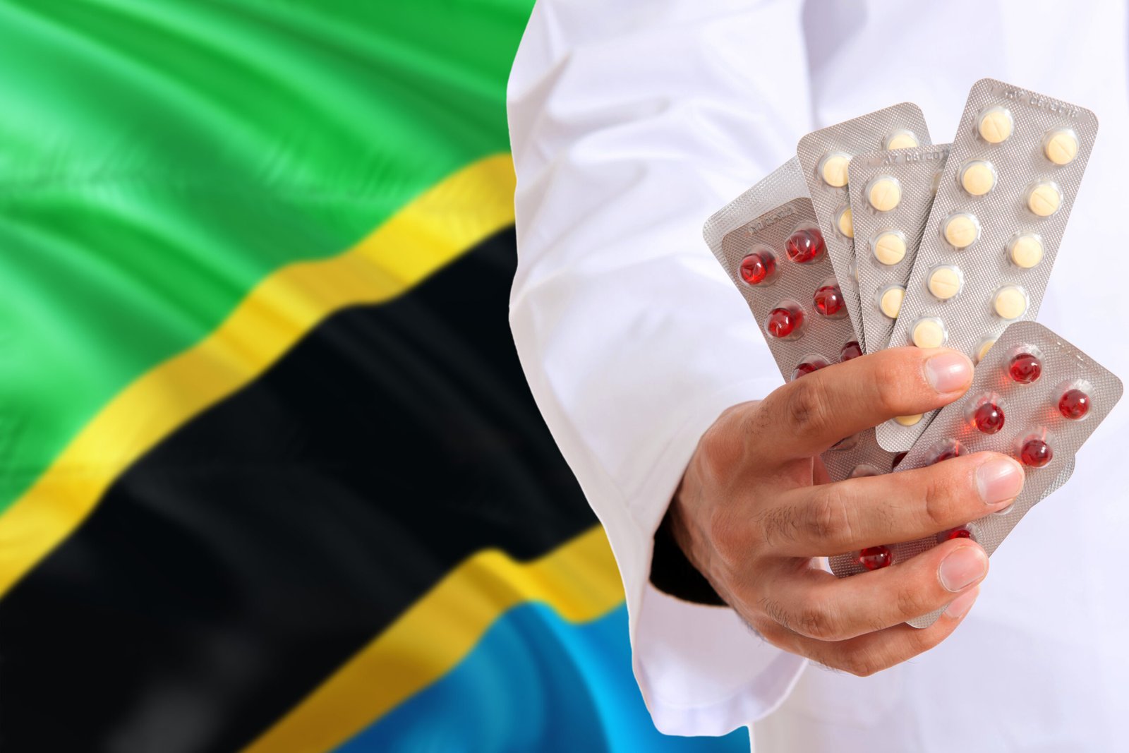 Prescription medicine with Tanzanian flag backdrop
